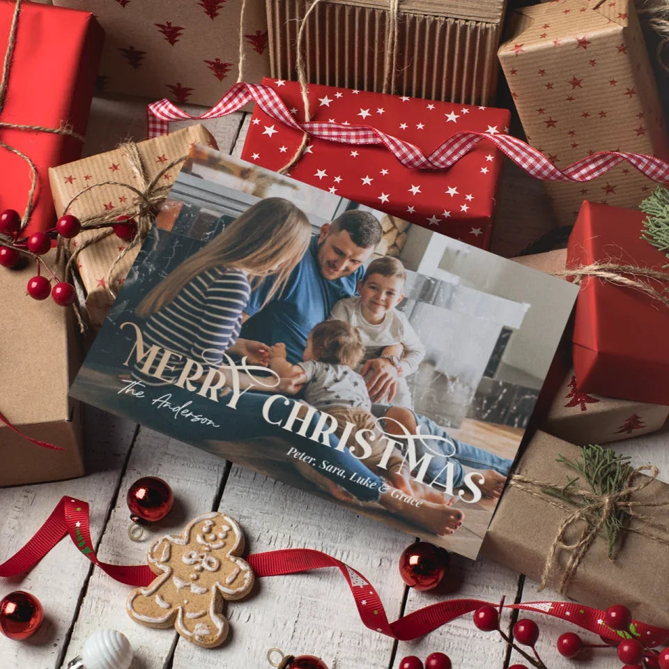 mockup-of-a-christmas-card-over-gift-boxes-and-red-decorations-23835